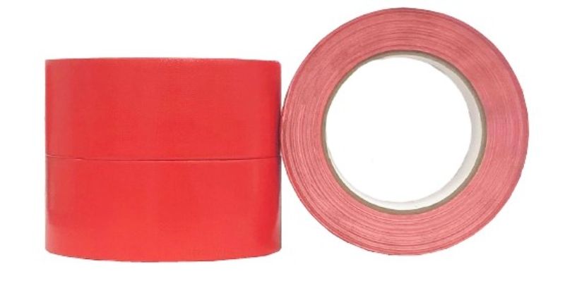 Bright red premium cloth tape (48mm x 30m) in a pack of 36, ideal for heavy-duty repairs and crafting with waterproof backing.
