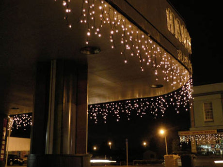 Icicle fairy lights with a black cable, 3m long, featuring warm white illumination and 120 LEDs for versatile indoor/outdoor use.