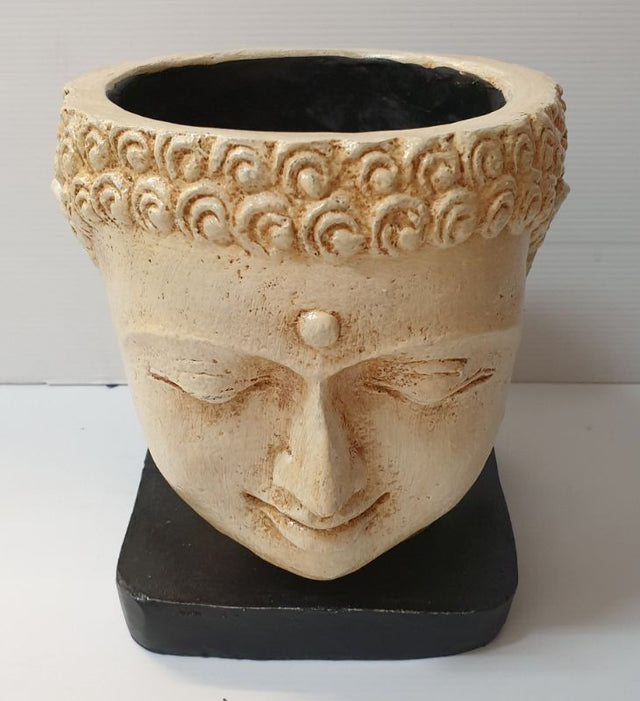 Buddha face plant holder in white, 20cm, perfect for adding tranquility and modern decor to indoor plants.