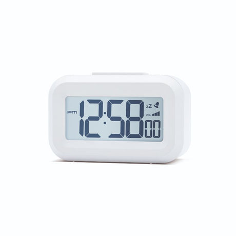 Compact white LCD alarm clock with snooze function and adjustable volume, perfect for bedside use.
