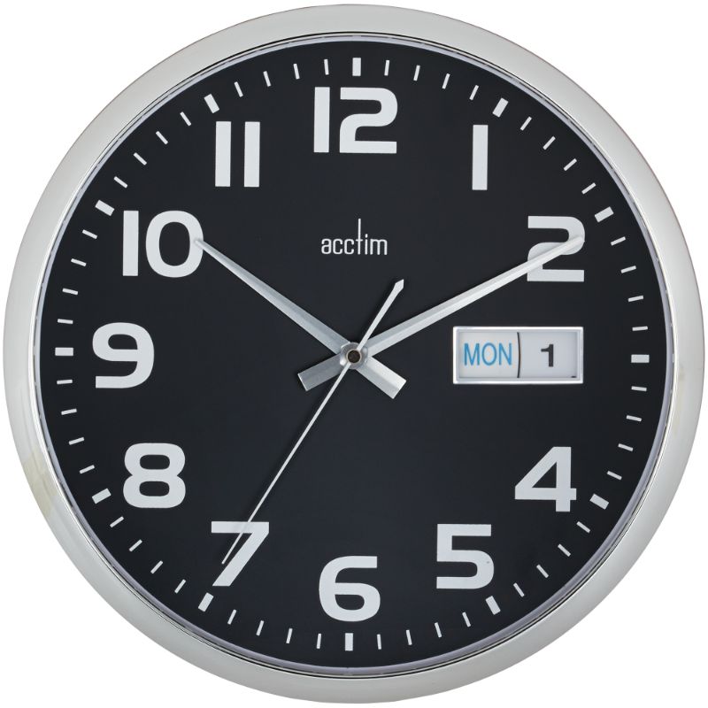 Elegant black dial wall clock with day/date display, quartz movement, and chromed plastic case, ideal for home or office.
