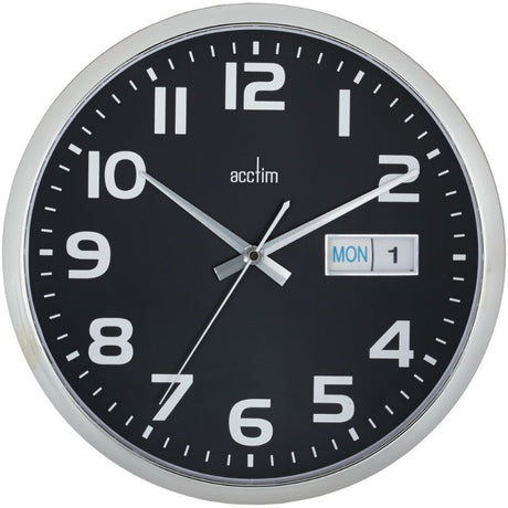 Elegant black dial wall clock with day/date display, quartz movement, and chromed plastic case, ideal for home or office.