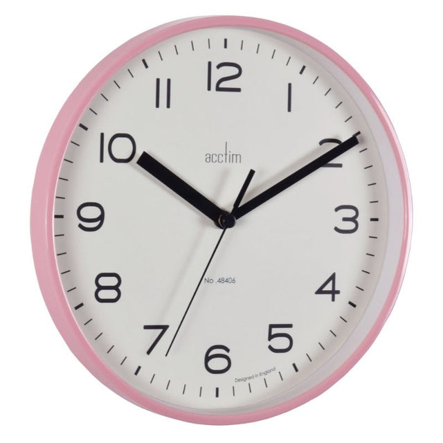 Blush pink wall clock with plastic case, glass lens, and quartz movement, perfect for stylish home decor.