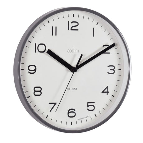 Smoke grey 20cm wall clock with a slimline case and glass lens, featuring precise quartz movement for stylish timekeeping.