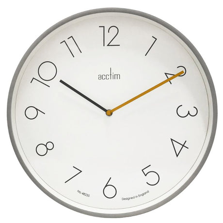 Large smoke grey wall clock with offset numbers and dijon yellow second hand, perfect for modern home decor.