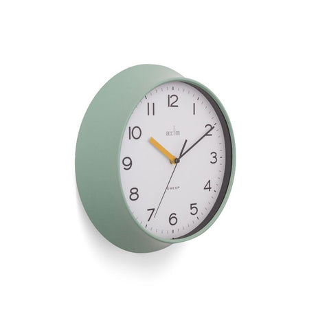 Dusty cool mint wall clock with bold numbers, retro design, and stylish pastel finish, measuring 29cm in diameter.