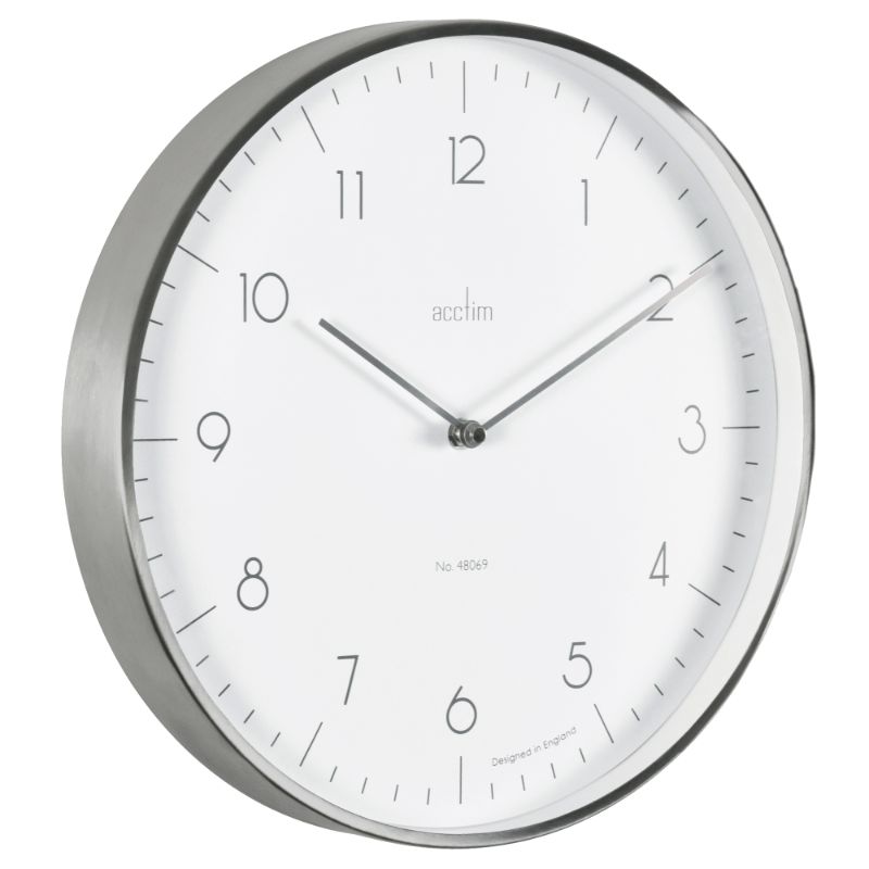Brushed metal wall clock with white face, embossed numbers, sleek hands; modern decor for any home.