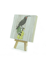 Art Block Plywood in light wood featuring elegant Huia artwork, eco-friendly, pre-drilled for easy hanging, 120mm square.