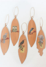 Wall art featuring a printed Pohutukawa leaf on 4mm thick Rimu veneer, ideal for gifting and indoor display.