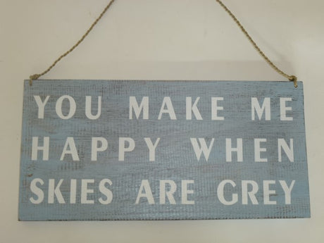 Bright wooden sign with the phrase "You Make Me Happy" elegantly engraved, perfect for indoor or outdoor decor.