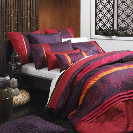 European pillowcase featuring vibrant spice embroidery and quilted texture, perfect for elevating bedroom decor.