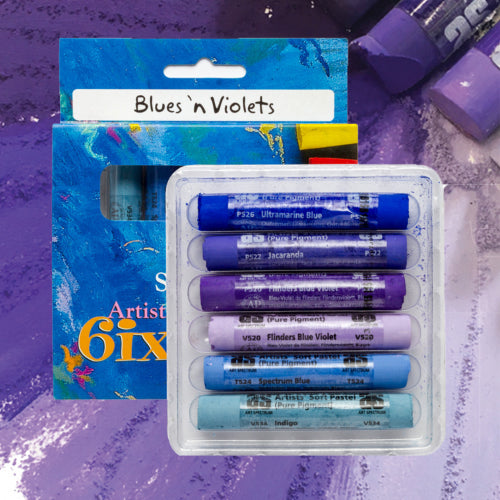 Vibrant 6-pack of artist pastels in blues and violets, perfect for blending and creating stunning landscapes or portraits.