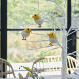 Colorful felt chick decorations for Easter, perfect for hanging on trees, wreaths, or garlands. Pack of 3.