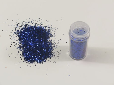 Royal blue, premium glitter in 1kg packaging, perfect for arts, crafts, and adding sparkle to projects.