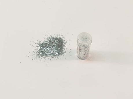 1kg of fine silver glitter from Das, perfect for adding sparkle to crafts, cards, and decorations; non-toxic and safe for all ages.