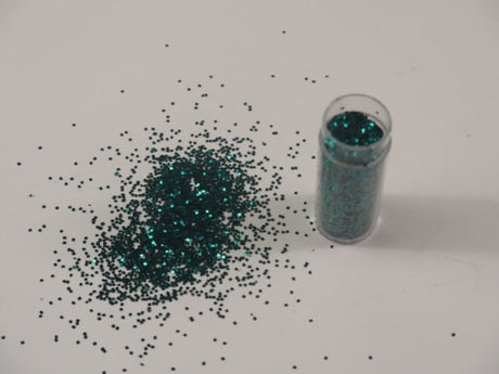 Vibrant 1kg teal glitter adds dazzling shimmer to crafts and art projects, perfect for artists and DIY enthusiasts.