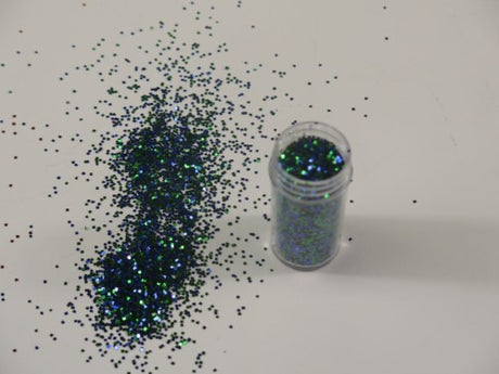 Vibrant peacock-colored glitter powder in a 250gm pack, perfect for adding shimmer to crafts and cosmetic applications.