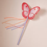 Colorful butterfly wand for dress-up, featuring delicate embellishments, perfect for imaginative play and special occasions.