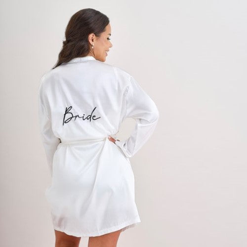 Luxurious white Hen Party Bride Dressing Gown with elegant 'Bride' embroidery for a stylish pre-wedding celebration.