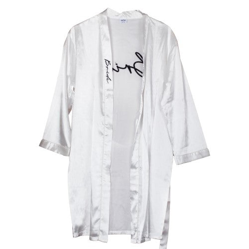 Luxurious white hen party dressing gown with 'Bride' in black stitching, perfect for pre-wedding celebrations.