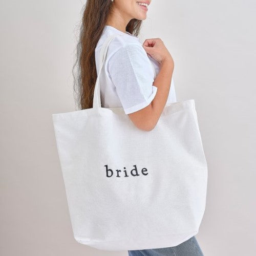 White canvas tote bag for hen parties, measuring 55cm x 71cm, perfect for carrying essentials and celebrating with style.