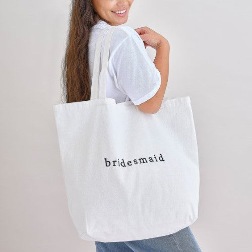 Elegant white bridesmaid tote bag made from soft cotton canvas, perfect for hen parties and bridal celebrations.