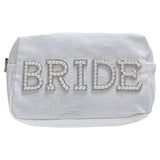 Elegant white cosmetic bag with pearl embellishments, perfect for brides to keep beauty essentials organized at hen parties.