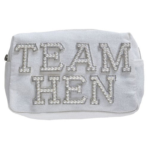 White cotton cosmetic bag with pearl embellishments and 'Team Hen' text, perfect for hen parties and bridal celebrations.