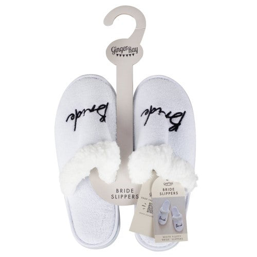 White fluffy bride slippers with 'Bride' embroidered in black, perfect for hen parties and bridal celebrations.