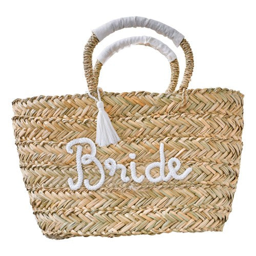 Stylish rattan Hen Party Bride Bag with white tassels and rope 'Bride' lettering, perfect for carrying essentials.