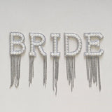 Vibrant 'Bride' patches in a pack of 5, perfect for adding flair to hen party attire and lasting keepsakes.