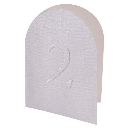 Elegant pack of 12 embossed table numbers for weddings, designed to enhance decor with modern luxury and sophistication.