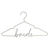 Elegant gold bride hanger designed to display gowns and enhance wedding day preparations with sophistication.