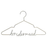 Elegant gold bridesmaid hanger, perfect for displaying dresses and as a personalized keepsake for wedding photography.