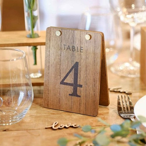 Rustic wooden tent table numbers 1-12, perfect for elegant weddings and events, adding charm and functionality.