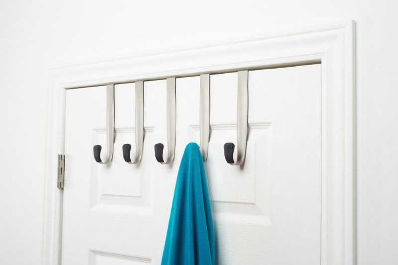 Schnook Otd 5 Hook in Black and Nickel, a stylish over-the-door solution with rubber tips for door and clothing protection.