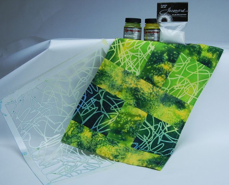 Jacquard Dye-Na-Flow Ochre 824 fabric paint in 66.54ml, vibrant, transparent, and versatile for various artistic applications.