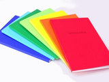 Colorful set of 7 Fabriano Journals with unique covers and various paper types, perfect for writing and creativity.