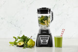 Alt text for Sunbeam Two Way Blender: "Sunbeam two-way blender in black with 2L Tritan jug and 7 functions for versatile blending."