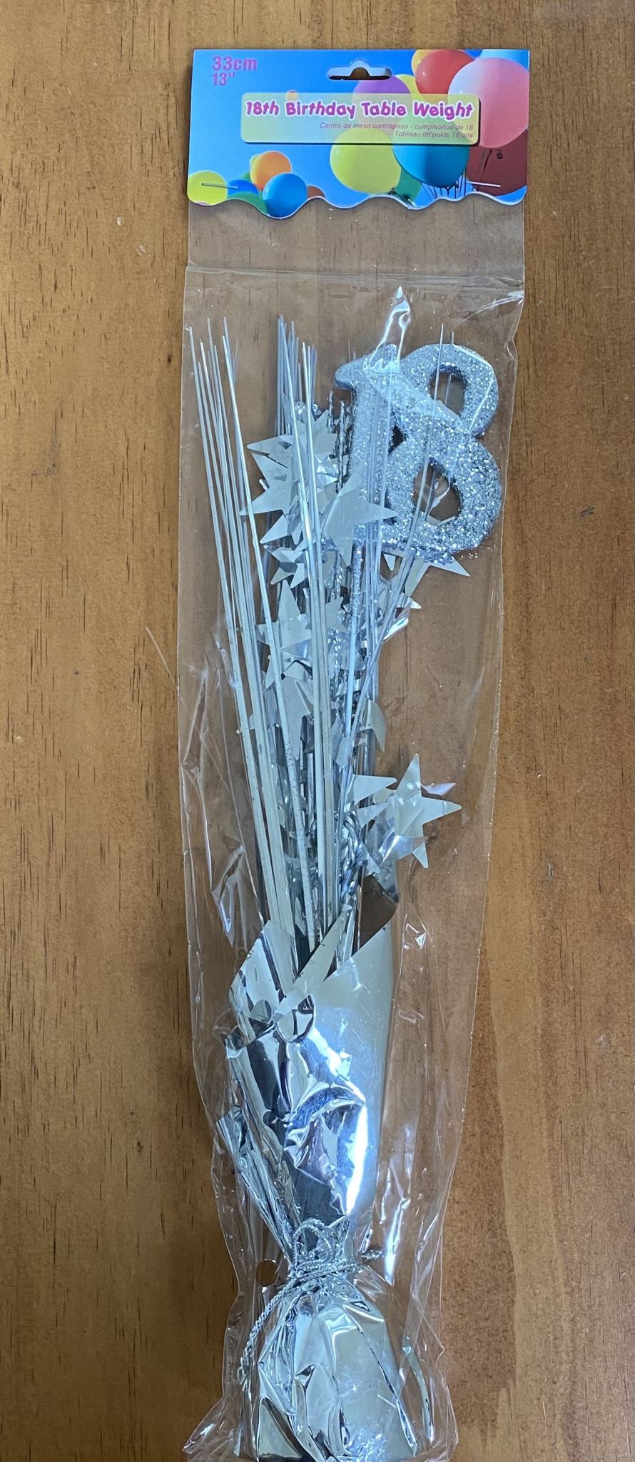 Elegant silver table weight for 18th birthday celebrations, perfect for enhancing party decorations and keeping items in place.