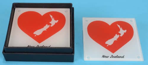 Tempered glass coaster set featuring heart designs, celebrating New Zealand. Comes in a sleek black gift box.