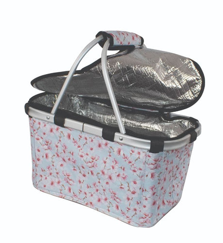 Insulated carry basket with zip lid featuring floral design, ergonomic handles, perfect for eco-friendly shopping and picnics.