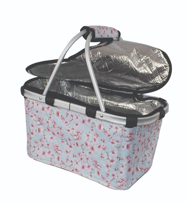 Insulated carry basket with zip lid featuring floral design, ergonomic handles, perfect for eco-friendly shopping and picnics.