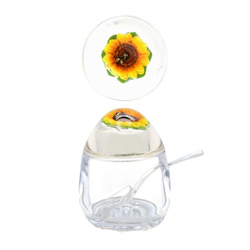 Acrylic jam pot with a sunflower lid featuring a honey bee design, perfect for storing jams and enhancing kitchen decor.