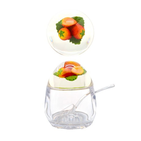 Acrylic jam pot with a whimsical strawberry lid, perfect for storing jams and jellies stylishly and securely.