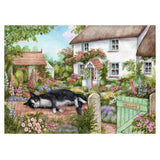 Cottage Cats jigsaw puzzle featuring 500 pieces of whimsical feline art by Debbie Cook, perfect for family fun.