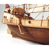 Detailed 1/60 scale model kit of the Red Dragon Chinese junk, featuring premium materials and a comprehensive guide for assembly.