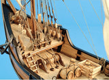 1:65 scale wooden ship kit of La Pinta, featuring laser-cut wood, hand-sewn sails, and detailed assembly guide for enthusiasts.