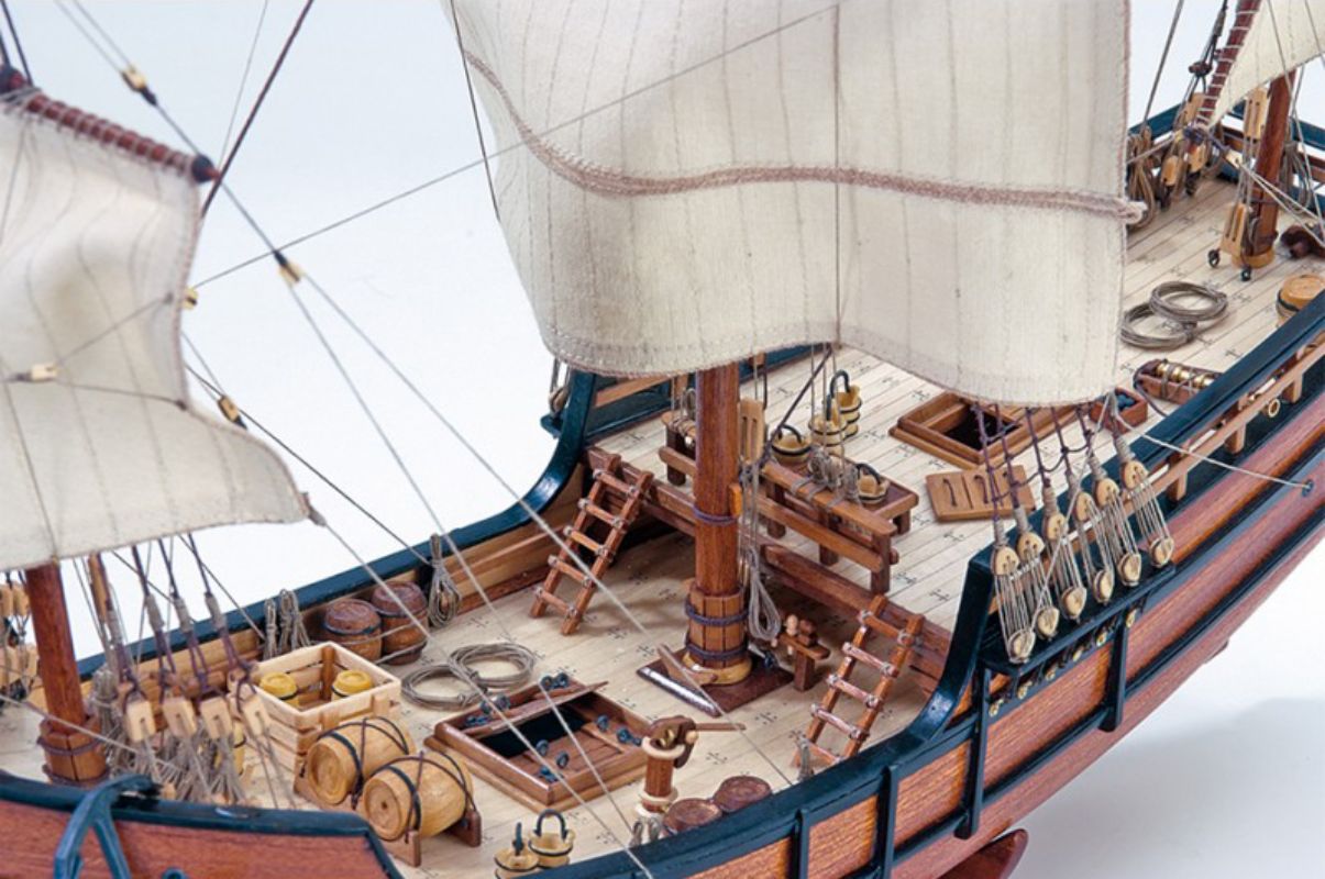 "1:65 scale Artesania Latina La Pinta wooden ship kit featuring precision laser-cut parts and hand-sewn sails."