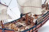 "1:65 scale Artesania Latina La Pinta wooden ship kit featuring precision laser-cut parts and hand-sewn sails."